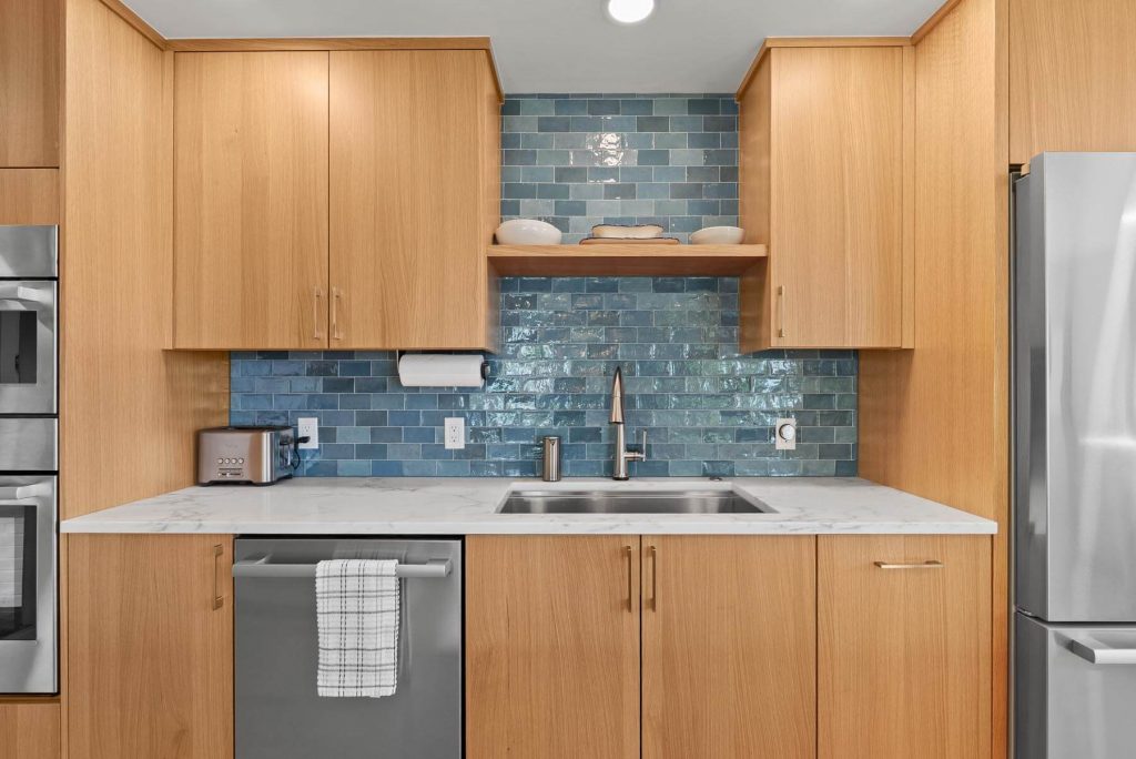 Kitchen with built-in cabinets and under-cabinet lighting